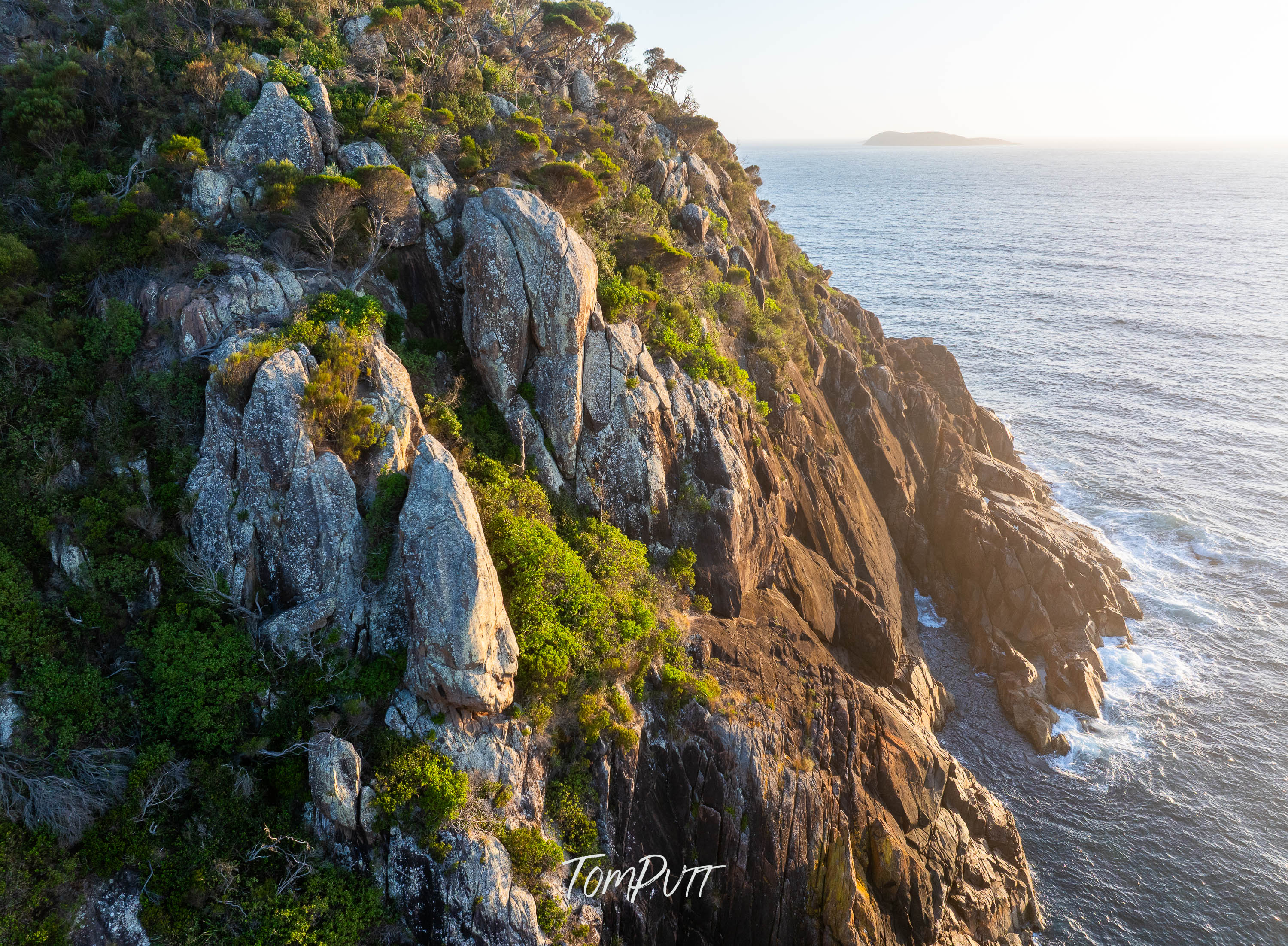 Sunlit Cliffs of Nelson Bay