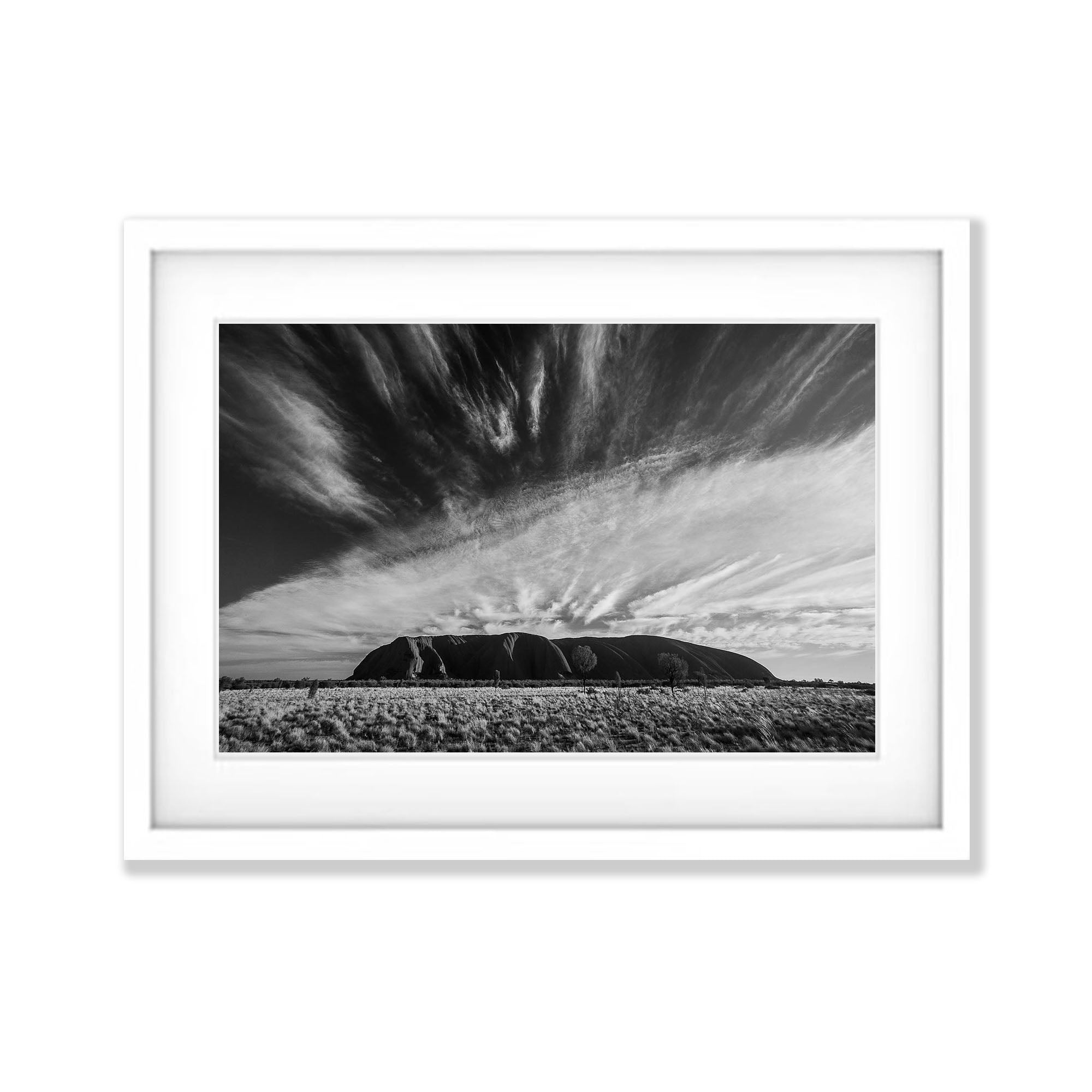 Clouds streaming over Uluru, Northern Territory