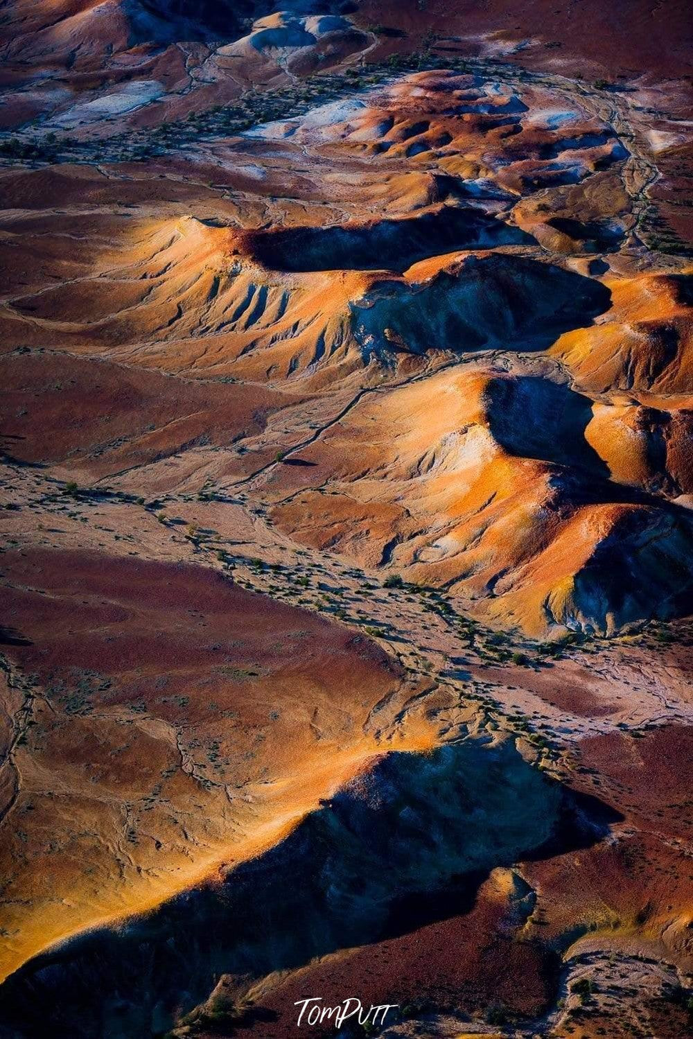 Beautiful desert with a lot of mound of sand and some powder and sand-colored powder on them with partially hitting sunlight, Desert Hills