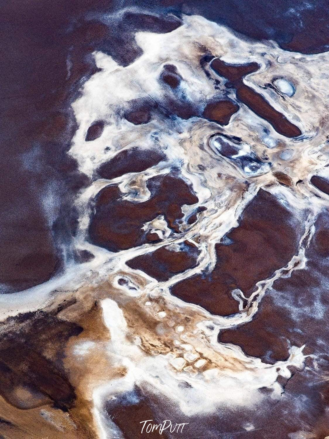 A weird shape of the smoky texture of dull white color with some sand color it the bottom and a solid maroon background, Desert Tussle