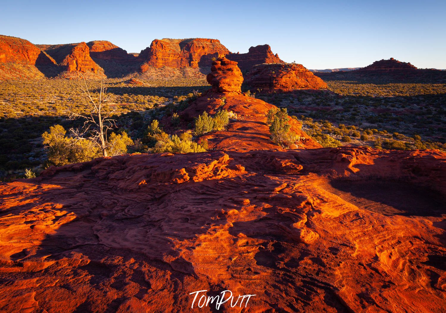 A long desert-like area with reddish mountain walls everywhere, Finke Gorge Sunset - Northern Territory