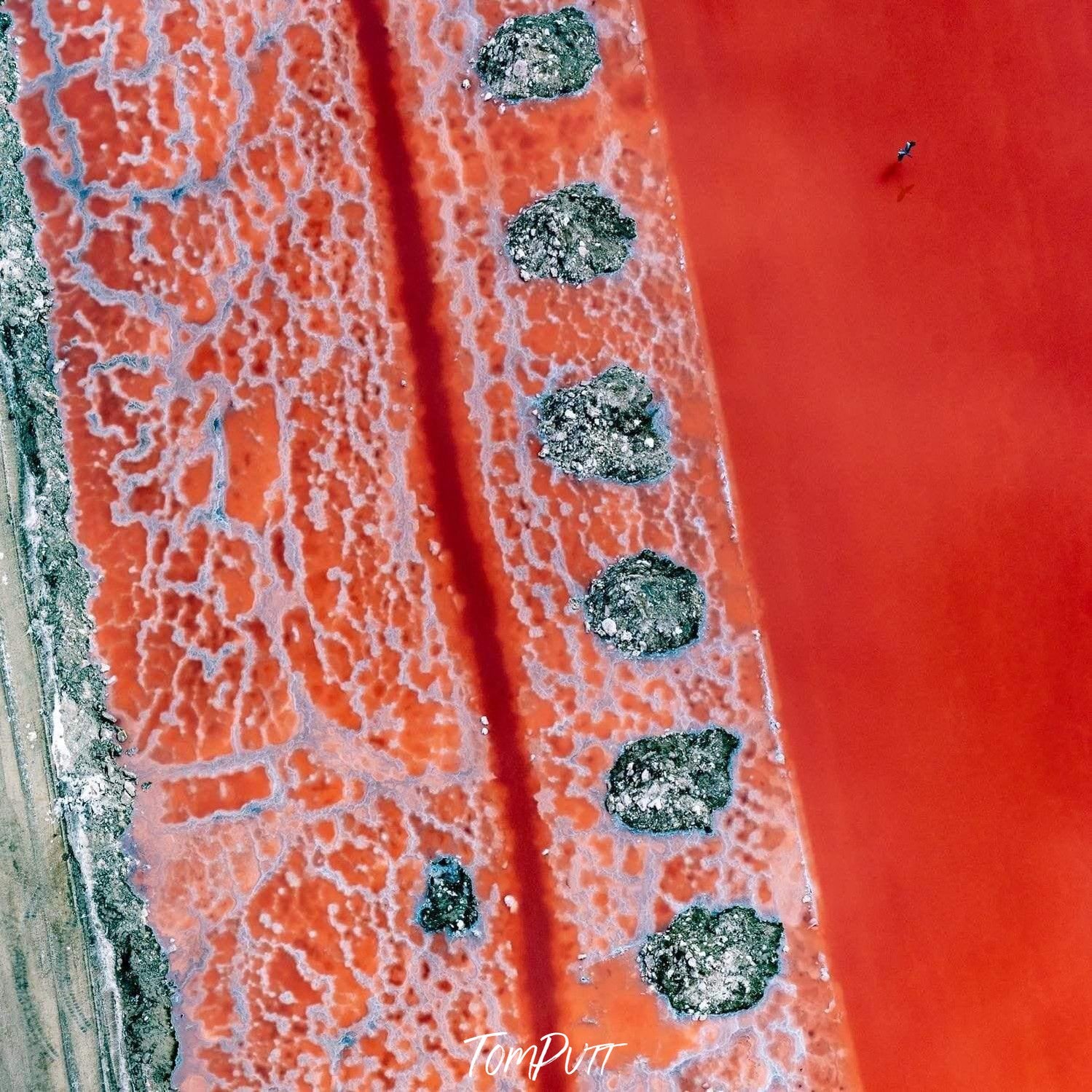 A red-colored artwork with some liquid waves and a greyish effect, Flying Low Namibia Art