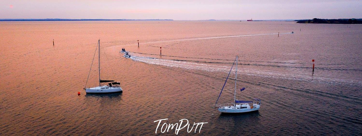 Two boats floating in the sea, Hastings Haze - Mornington Peninsula VIC