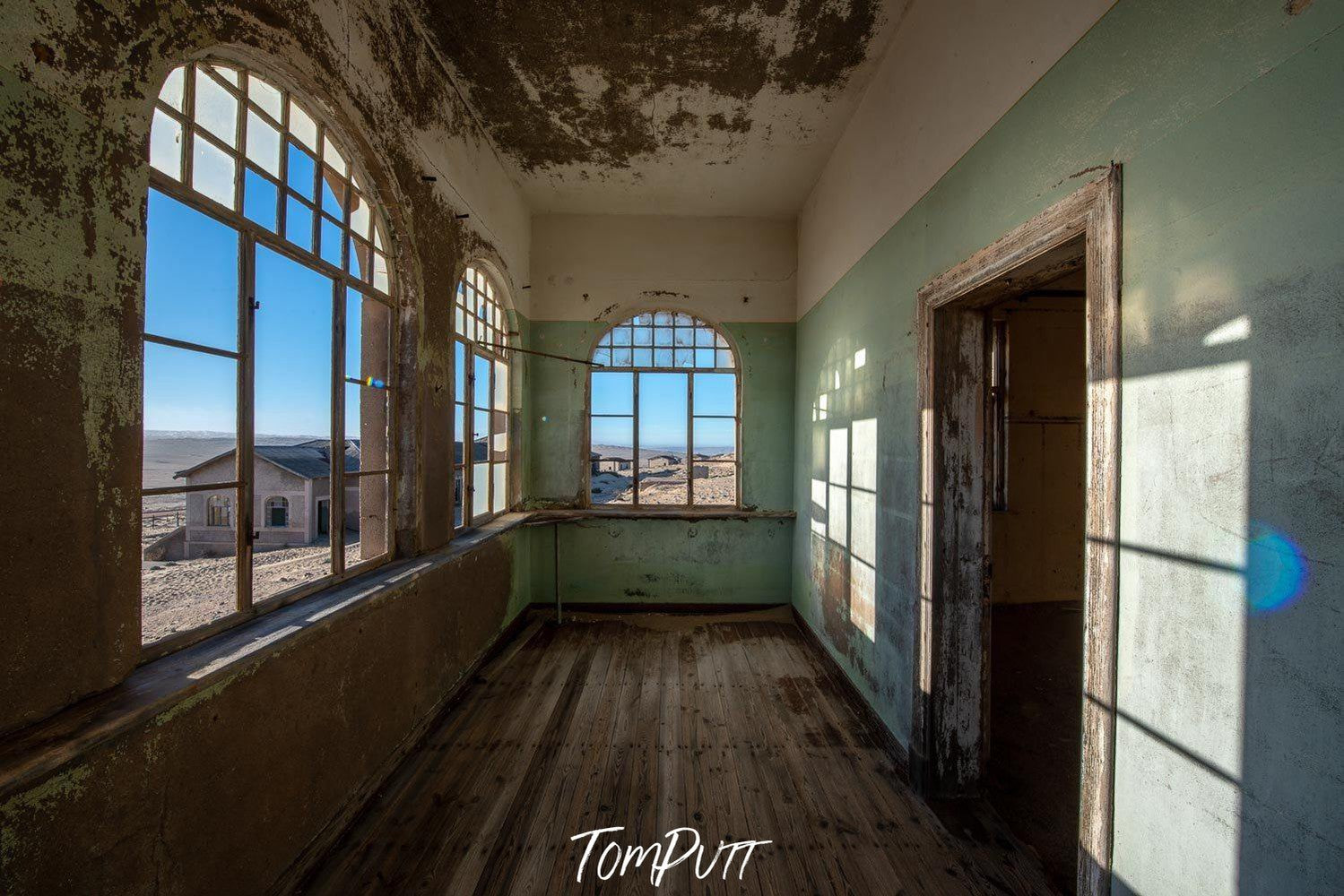 Open housing corridor with shiny sunlight shadows, Kolmanskop No.25