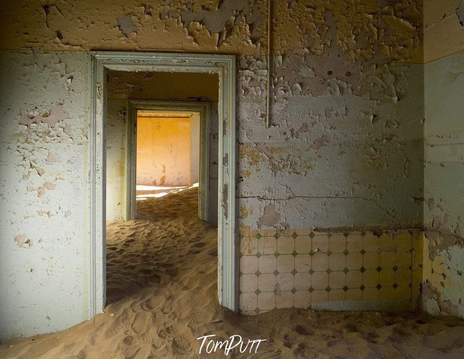 Making of a house with an open door of room, some construction sand inside, Kolmanskop No.6