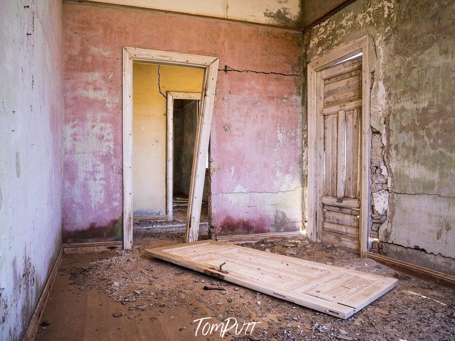 The broken door of a room of a constructing house, Kolmanskop No.9