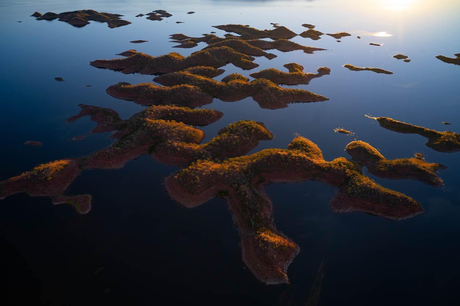 A large sequence of green mountain series in the lake, Lake Argyle #9 - The Kimberley