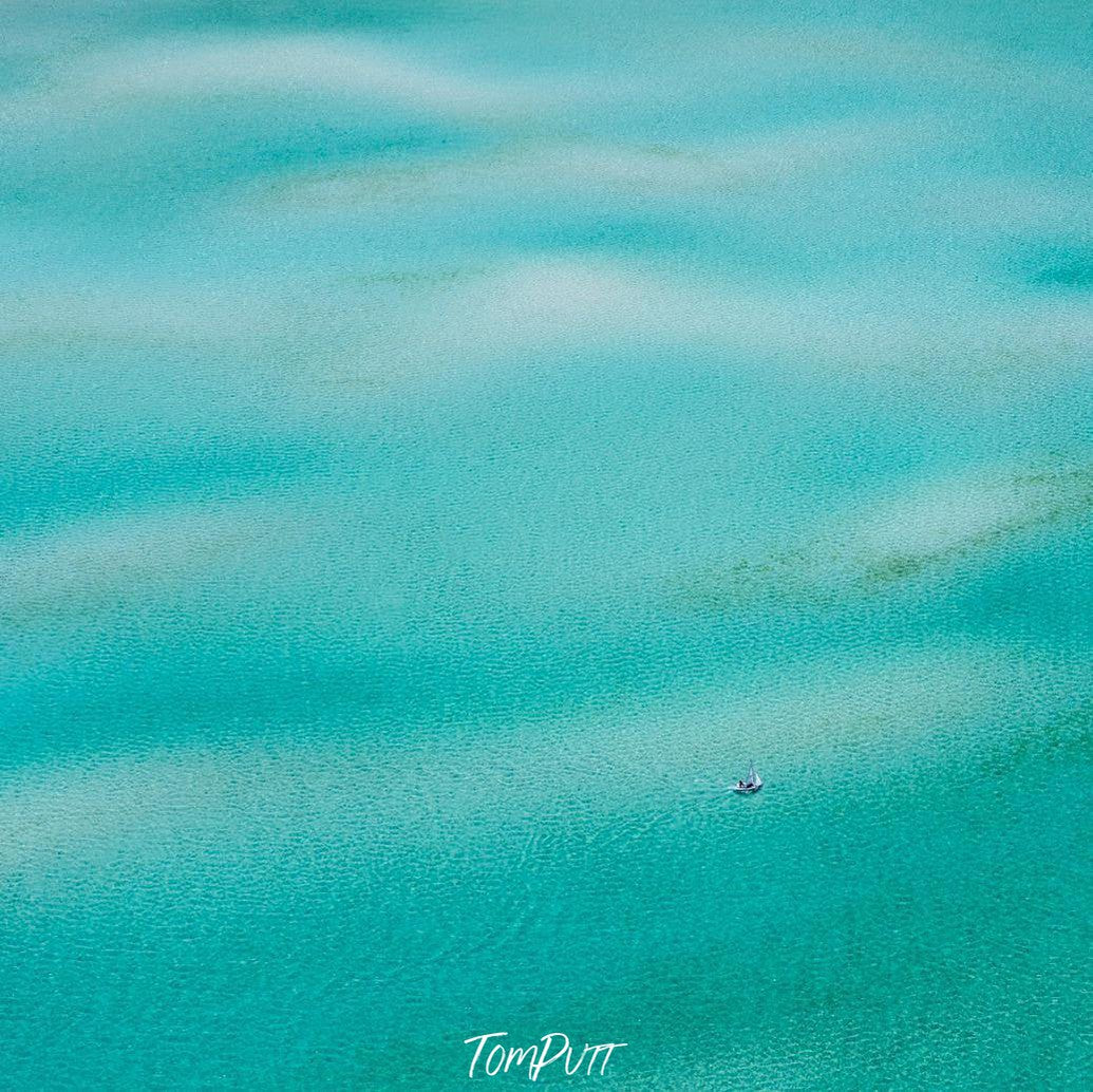Sky blue artwork depicting a sea, Lone Sailor - Mornington Peninsula VIC