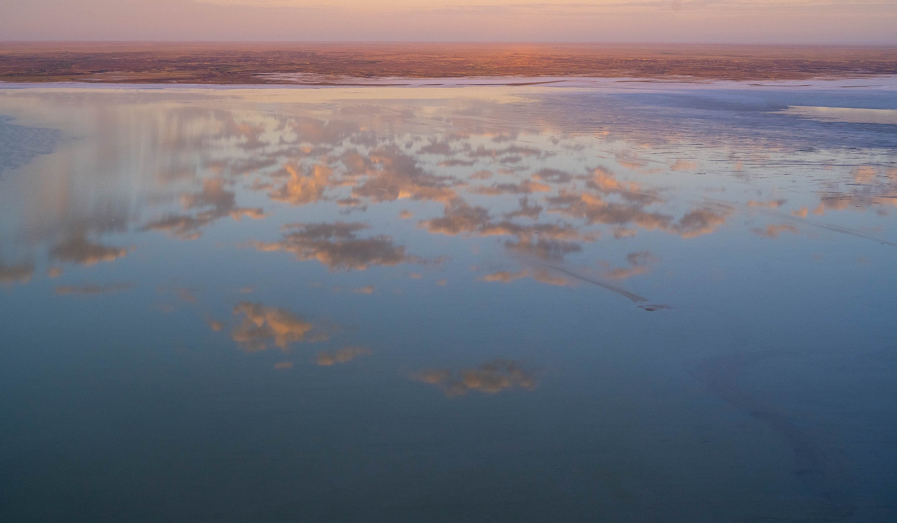 Morning cloud reflected in Belt Bay