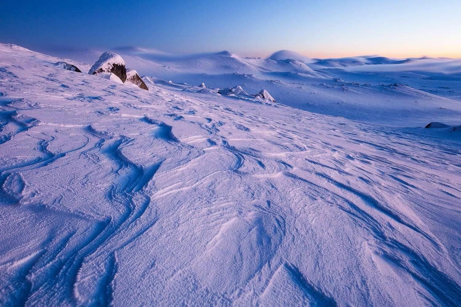 A purplish effect on a wide snow-covered land, Snowy Sunrise - Snowy Mountains NSW