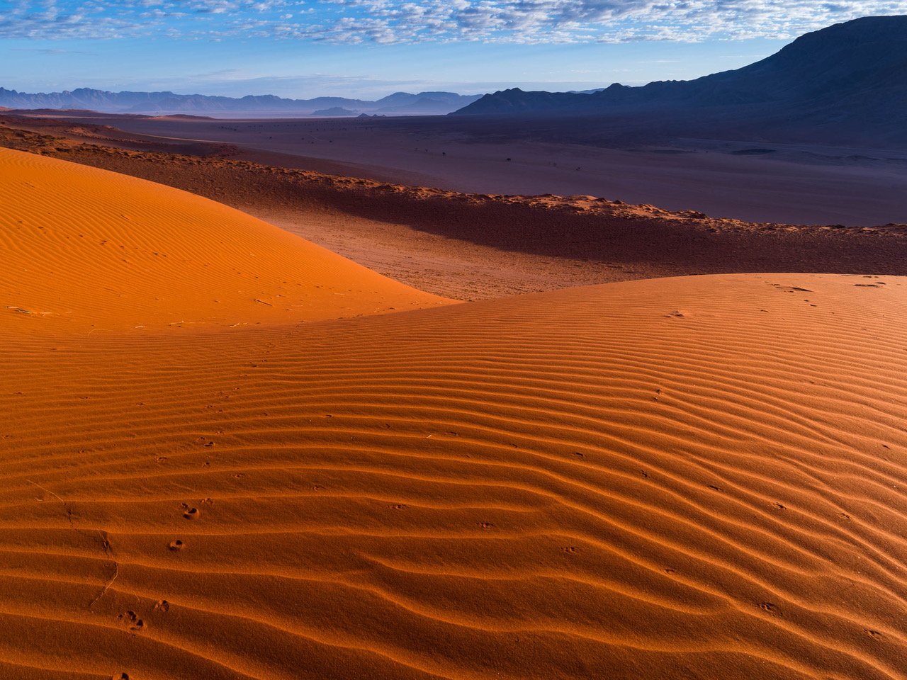 Curvy sand of a desert, with large mountains beside, Namibia #25, Africa
