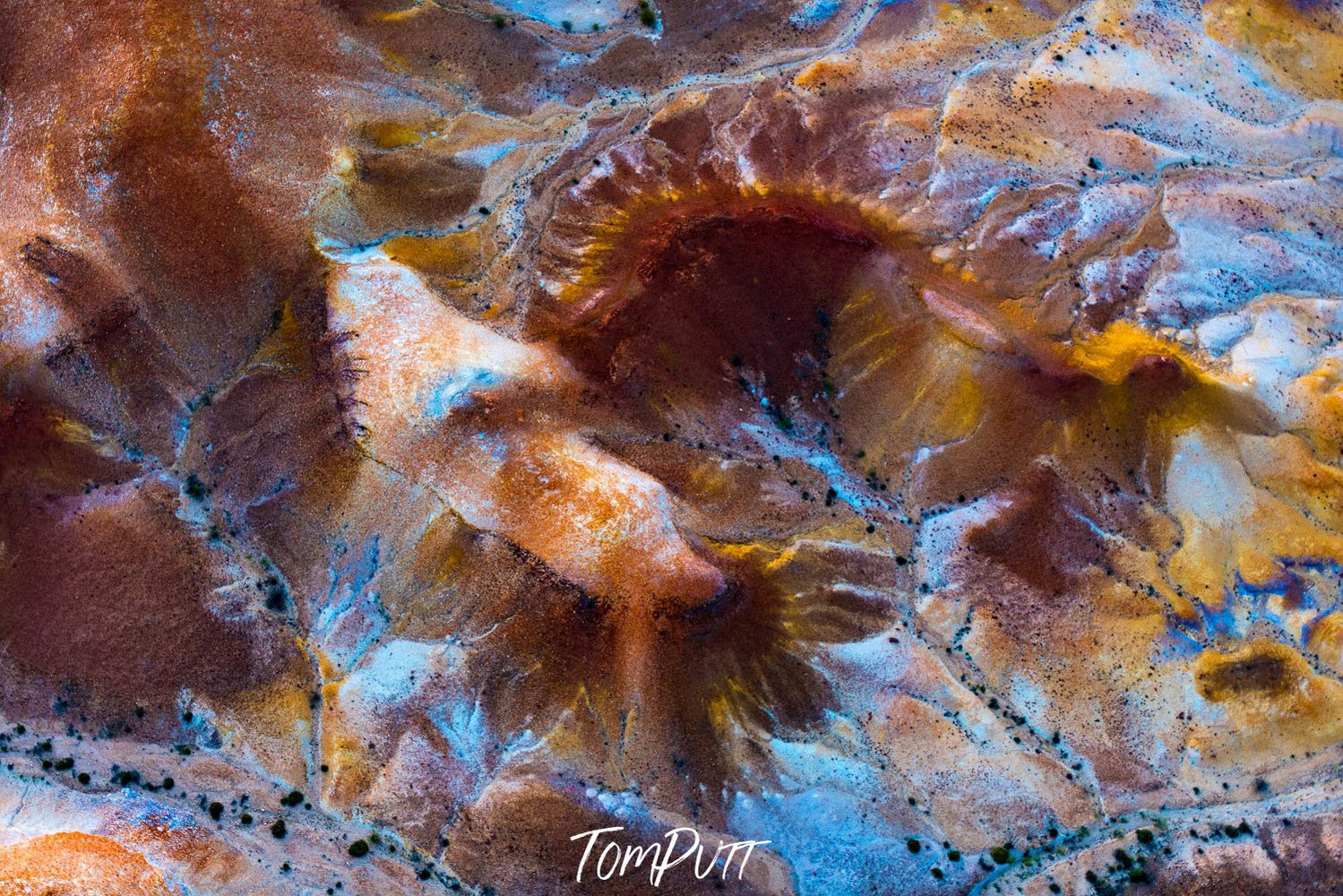 Aerial view of huge brown sand waves with golden and powder color painted shades, Painted Hills #13