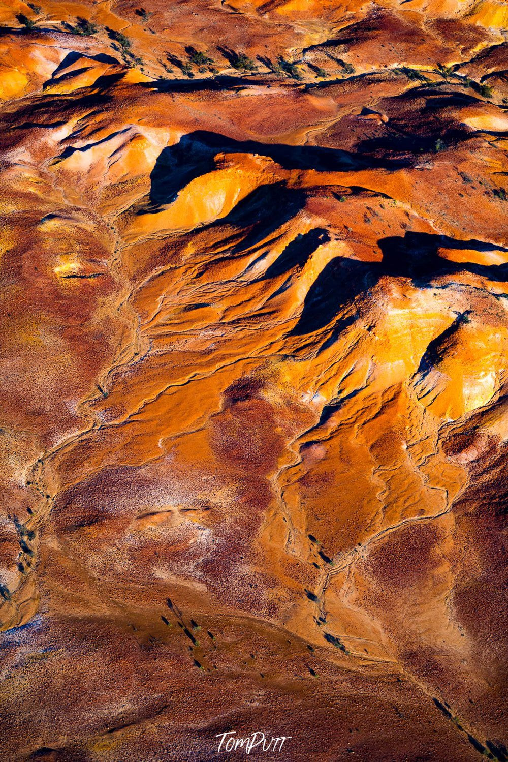 Aerial view of a painted rocky mountains texture on a desert-like surface, Painted Hills #26