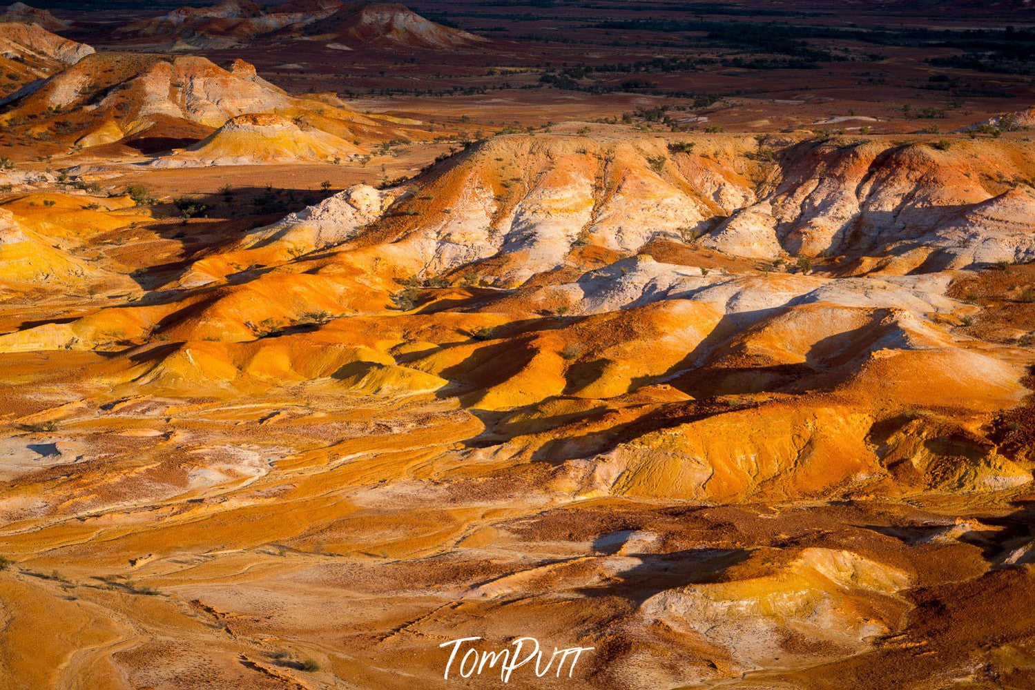 Aerial view of the land of shining powder and mustard color mountain walls with the shiny effect of sunlight, Painted Hills #9