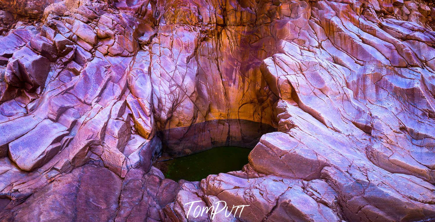 A rocky mountain wall with a hole, Redback Gorge abstract, West MacDonnell Ranges - Northern Territory