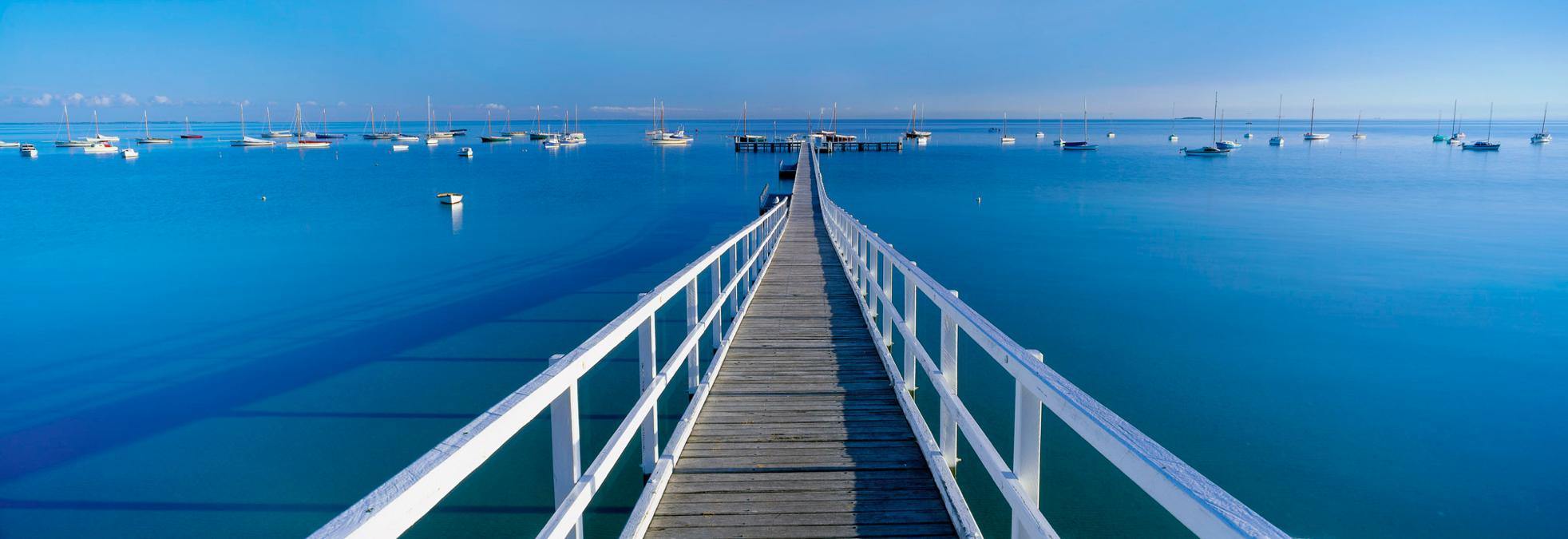 A long safety wooden bridge over the sea, Sorrento Pier - Mornington Peninsula VIC
