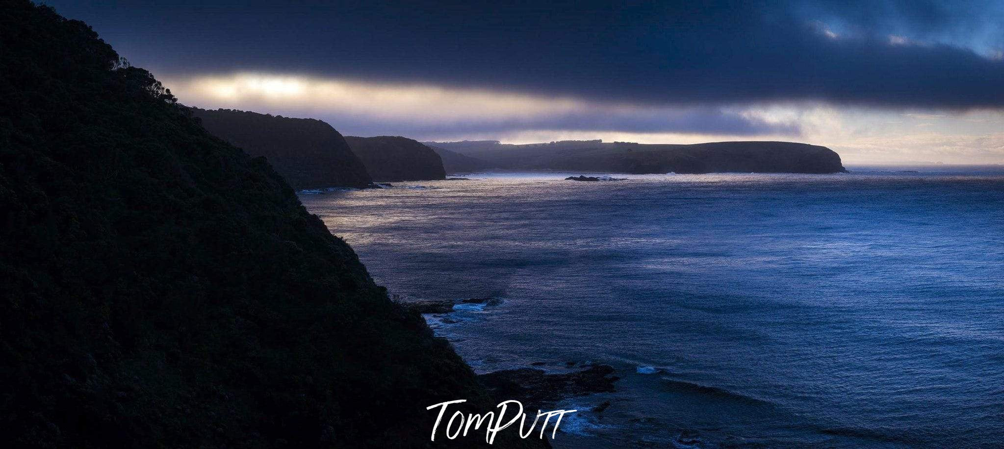 Dark lake surrounded by giant black mountain walls, Stormy Morning, Cape Schanck - Mornington Peninsula VIC