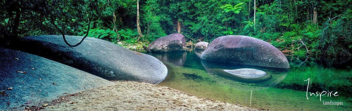 A fresh green area with some boulder and a clear watercourse, The Boulders, Babinda, Far North Queensland