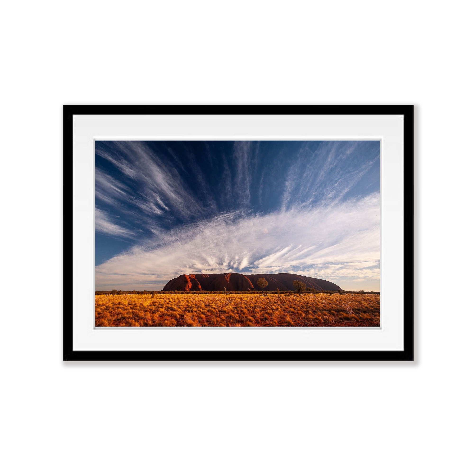 Uluru Sunrise with streaming clouds, Central Australia