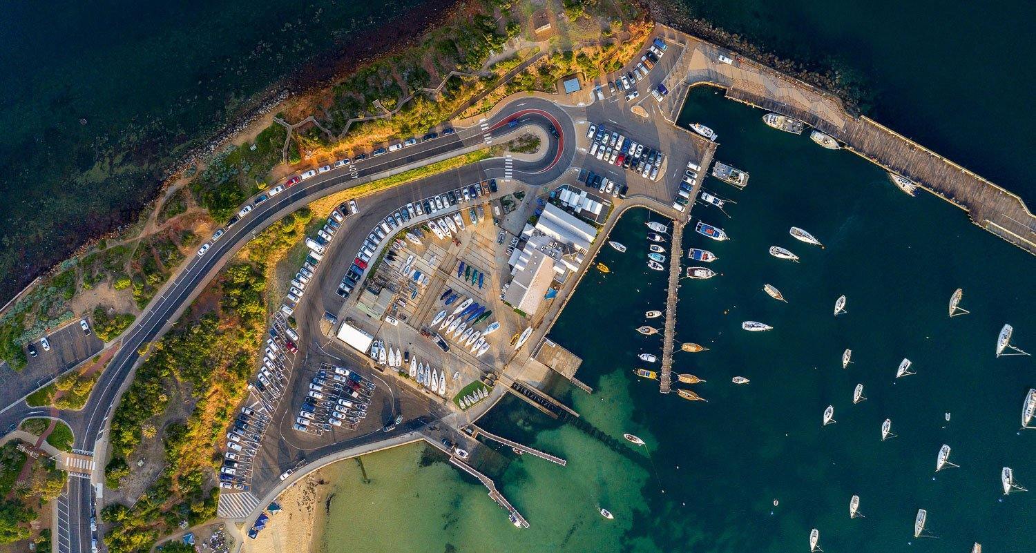 A long-shot aerial view of a seaport with a lot boats, View from Above - Mornington Peninsula VIC
