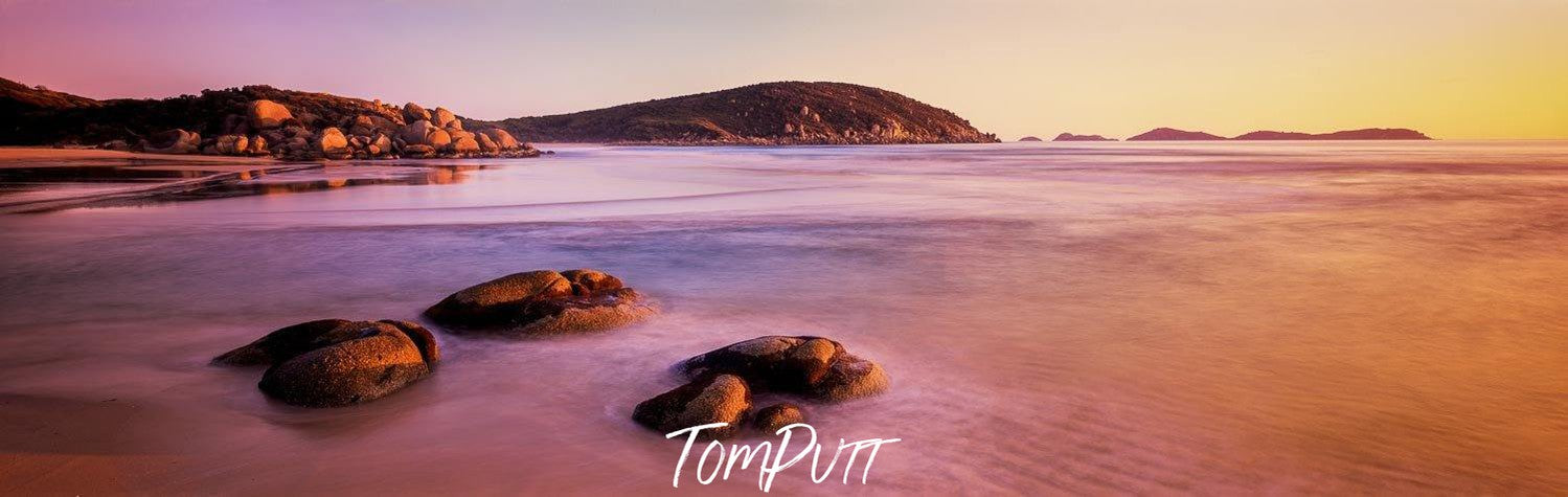 Big stones on the seashore with some massive mounds behind, Whisky Sunset - Wilson's Promontory VIC