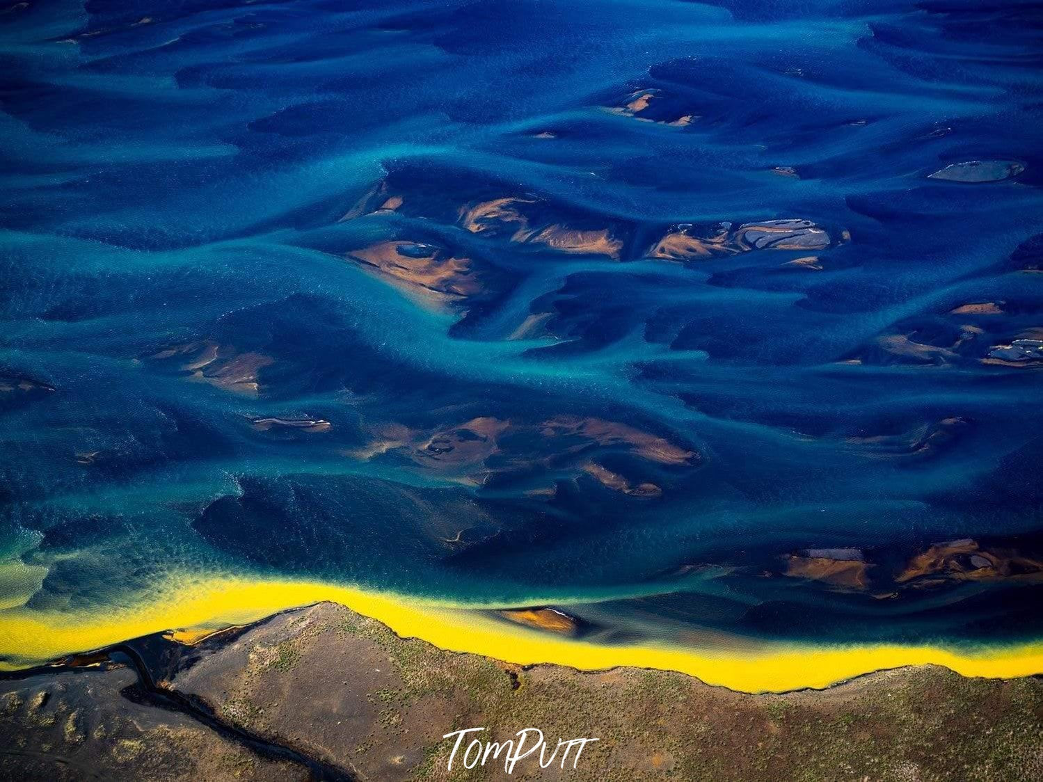 A giant deep water sea with gold shades under and a shiny yellow boundary line at the corner, Yellow Line