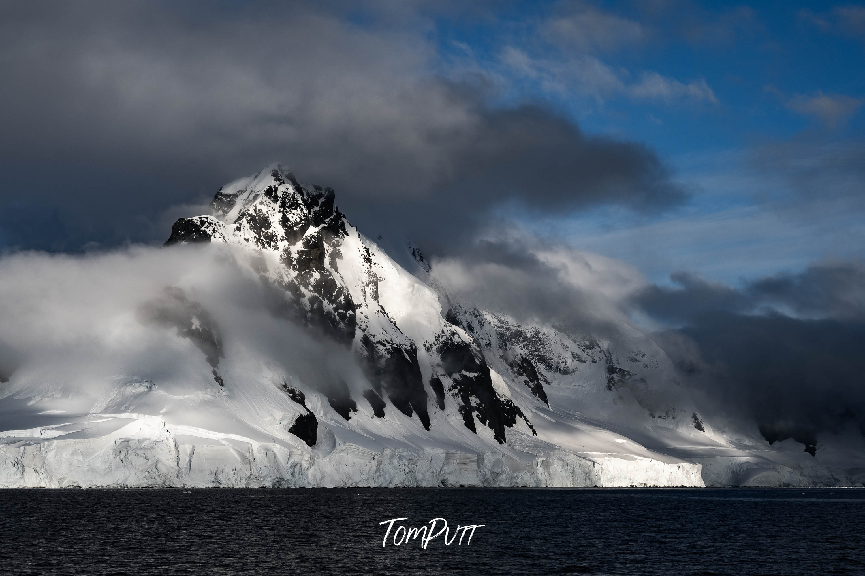 The Silent Symphony of Mountains and Clouds, Antarctica