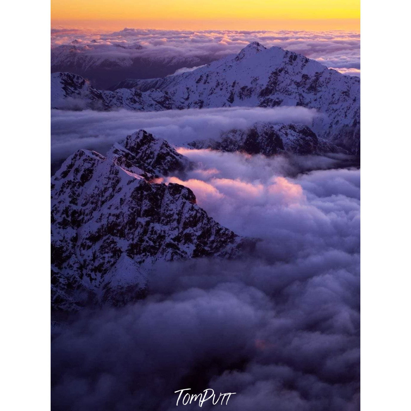 Giant Mountains peak covered with dense snow into the clouds, Alpine Glow - New Zealand