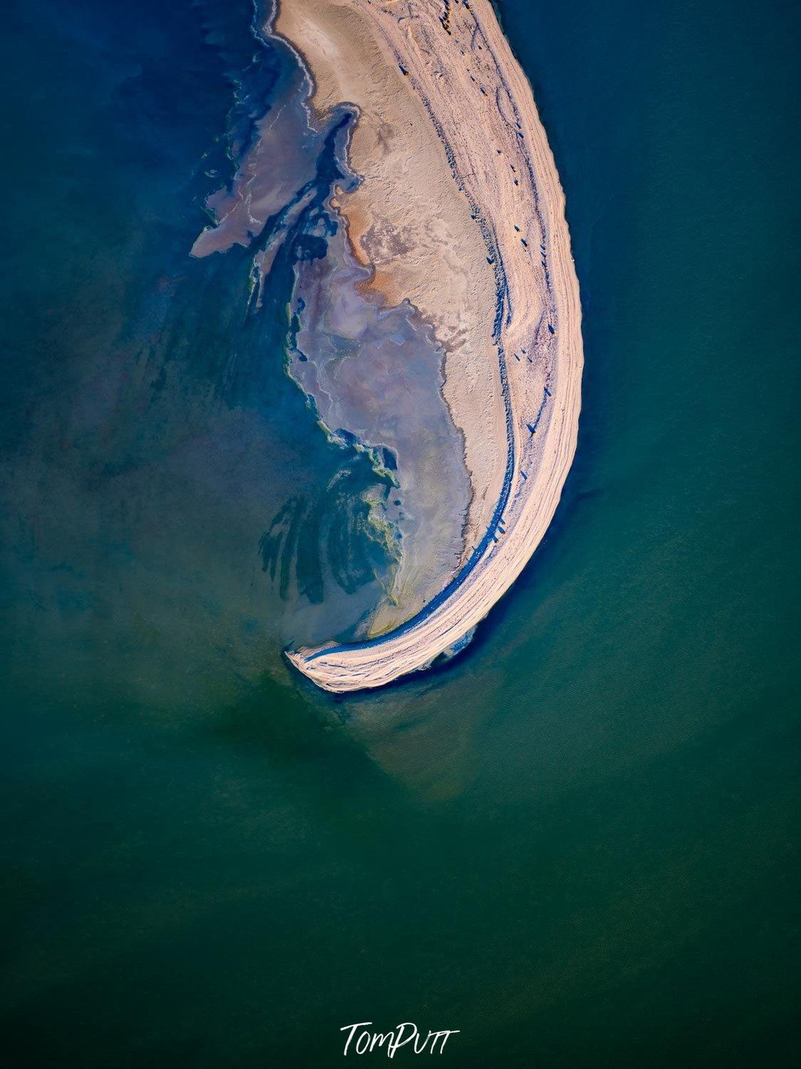 A weird shape of the land with the sea-green oceanic surface in the surroundings, depicting a human-less island, Bent Wall Décor Art