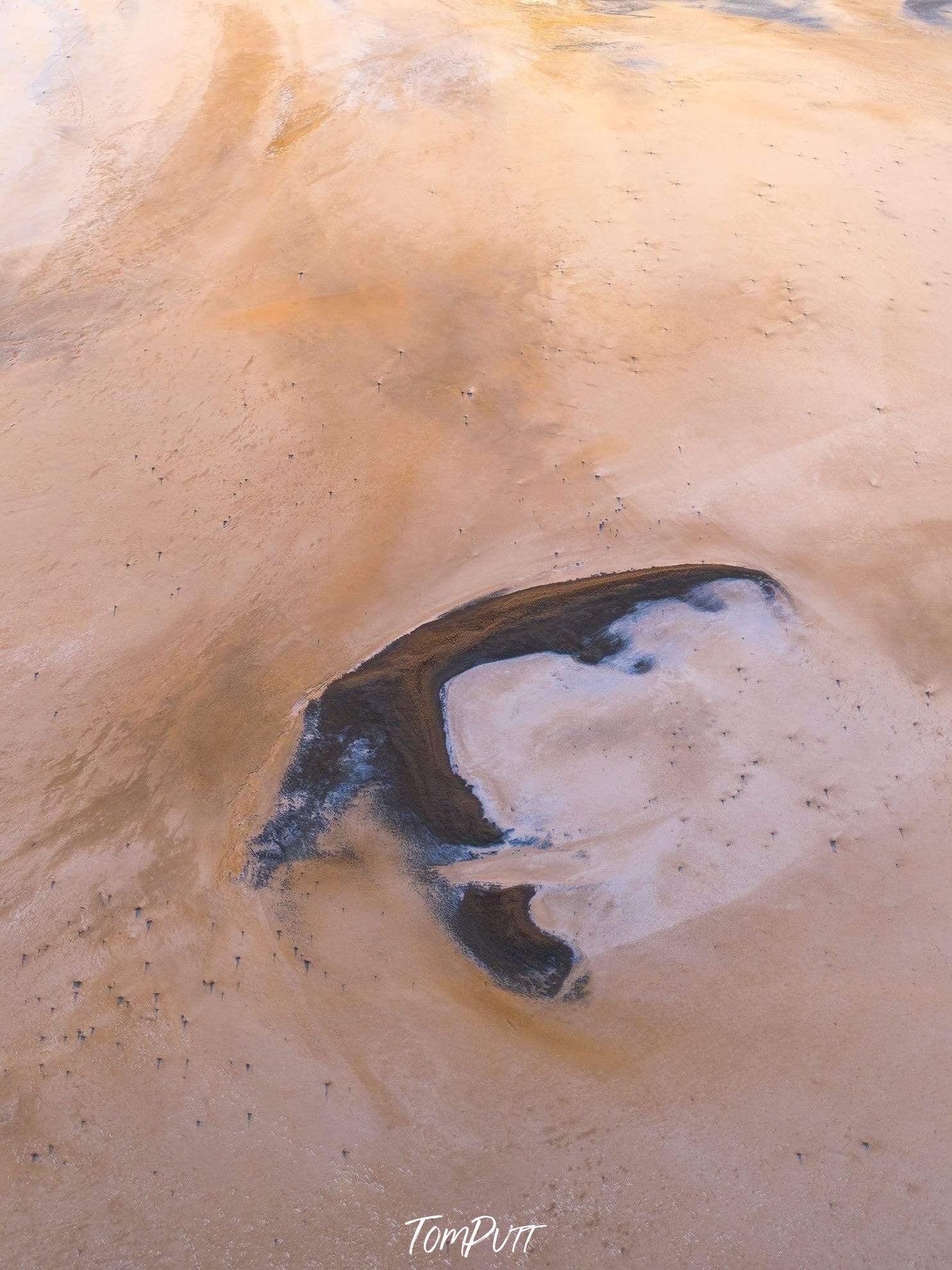 Large desert-like land with chocolate and smoky-colored mound depicting like ice-cream, Boomerang