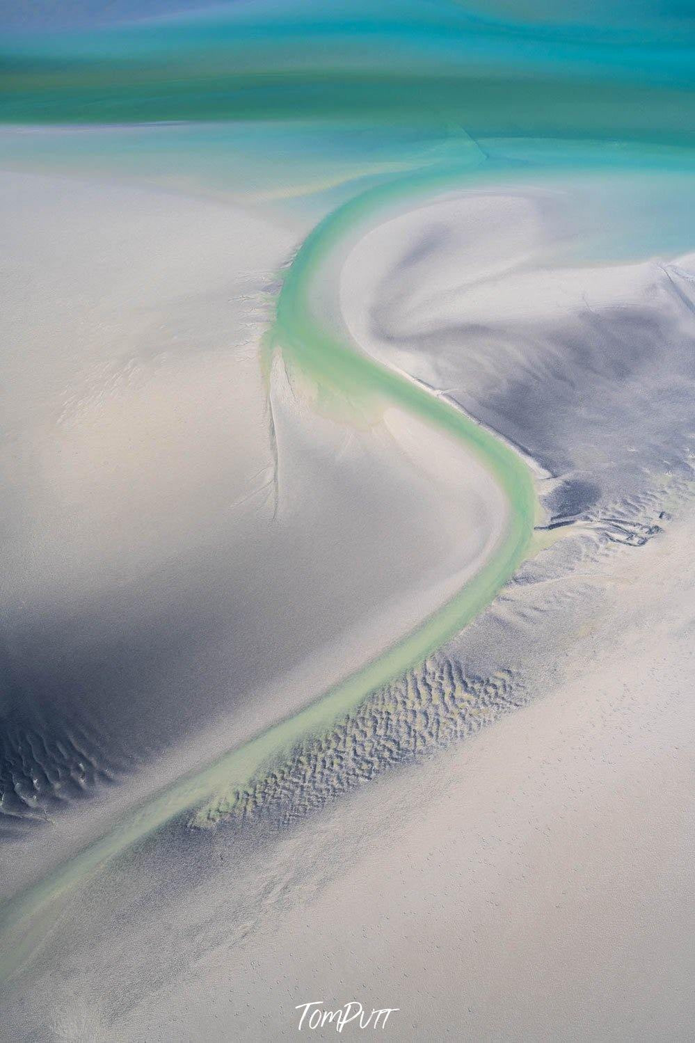 An unknown pattern of a long road-like green-colored line onto an oceanic surface making a blue, powder and sea green shade, Broome No.11