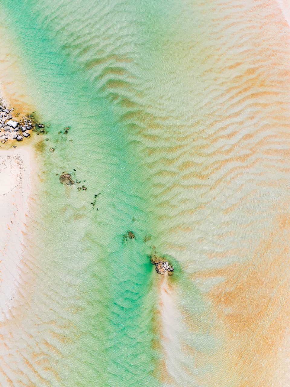 Aerial view of the desert having a zig-zag texture and some green shades, Broome #56