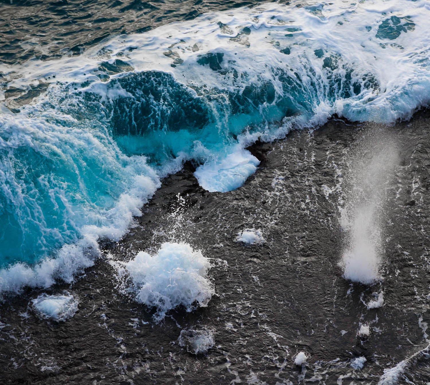 Dense sea waves making giant bubbles of clear blue water with white sea suds, and a grey colored water before and after the bubbling zone, Bubbling Seas 2, Eyre Peninsula  