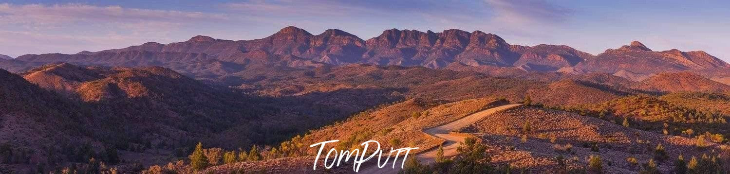 A landscape view of huge mountain walls with beautiful greenery on the land and mountains, Bunyeroo Valley Panorama, Flinders Ranges, SA