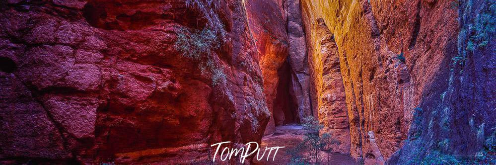 A beautiful array of bright colorful mountains making a pathway to the out, Canyonlands - Mini Palms Gorge, Purnululu