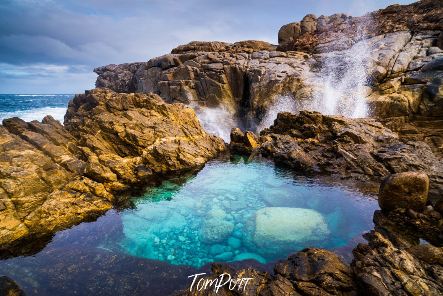 A breathtaking natural swimming course surrounded by unique rocky stones, Fully transparent crystal blue water with a small waterfall coming across the pool, Cape Carnot at Whalers Way, Eyre Peninsula