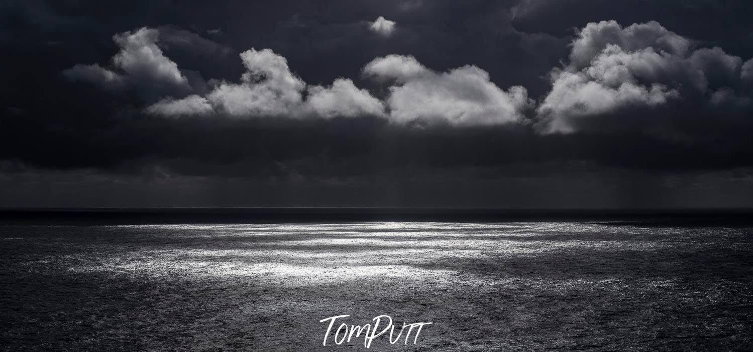 A dark night view with some smoky clouds, and an effect of highly bright moonlight on the surface of the land, Cape Schanck clouds - Mornington Peninsula