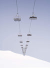 a beautiful view of a chairlifts series above the land fully covered with the fresh snow, Chairlift Mt Hotham, Victoria 