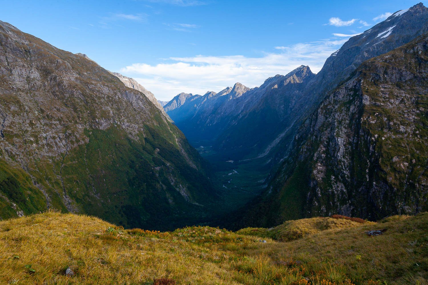 A High and beautiful sequence of green mountains fully covered with grass and bushes, Clinton Valley, Milford Track - New Zealand