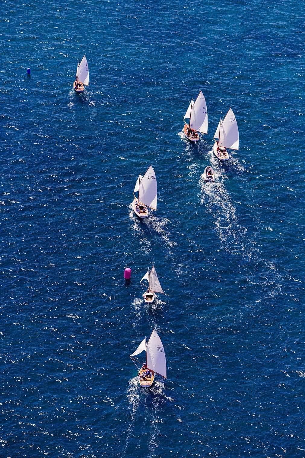 Couta boat racing in the dark blue ocean, Couta boat racing, Sorrento - Mornington Peninsula Victoria 