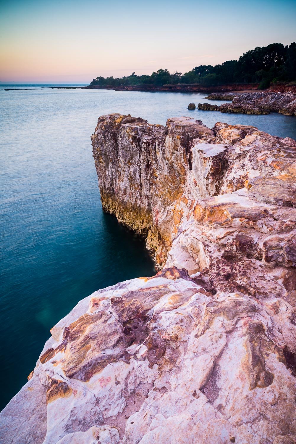 Giant Rock in the sea with natural mountain texture and some greenery on the right side, Arnhem Land 15 - Northern Territory