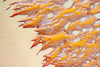 A large texture of sand color with a sequence of random autumn leaves-like texture of orange color, Derby #9