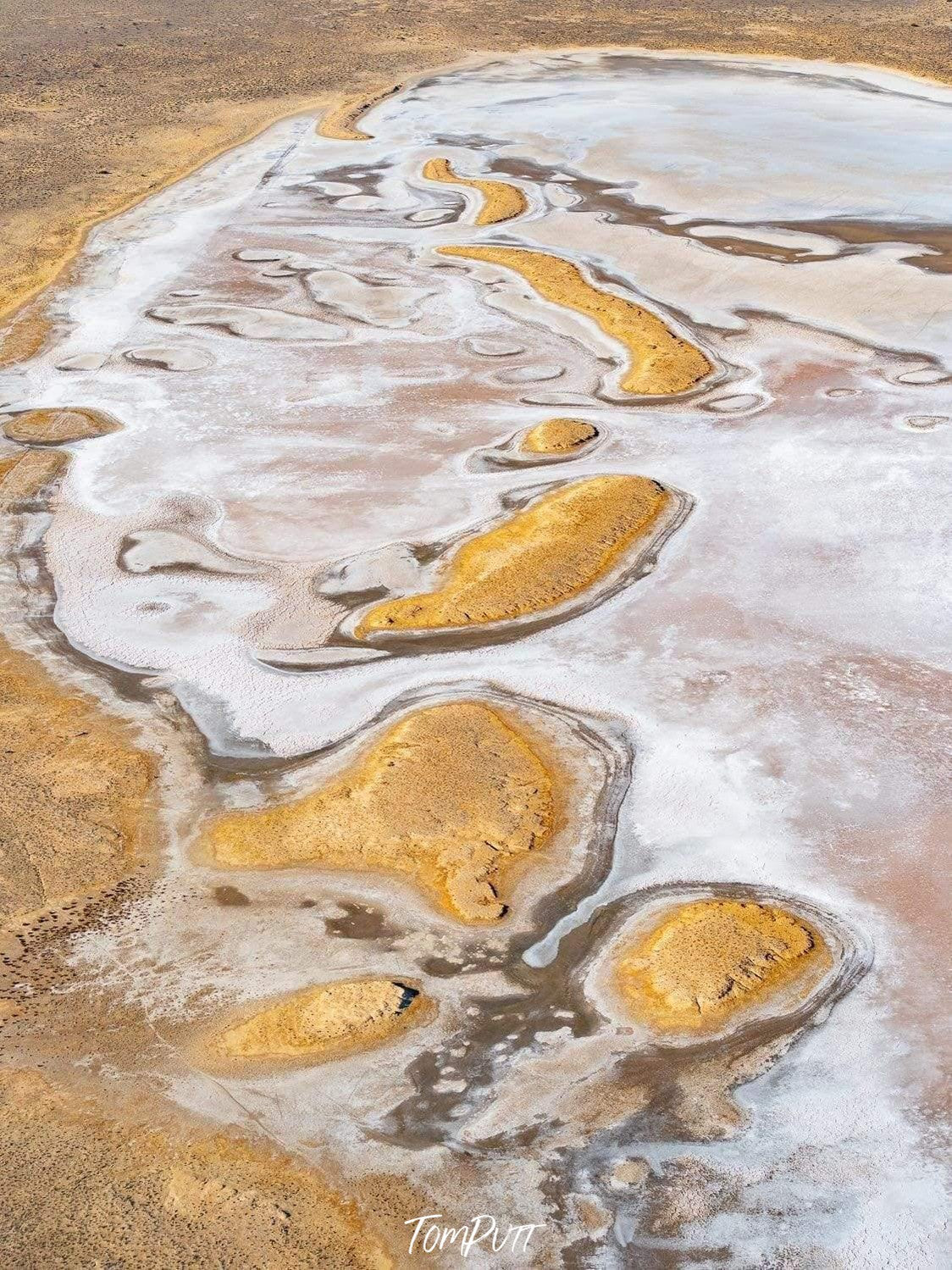 A desert land with some standing powder-color water, Desert Islands