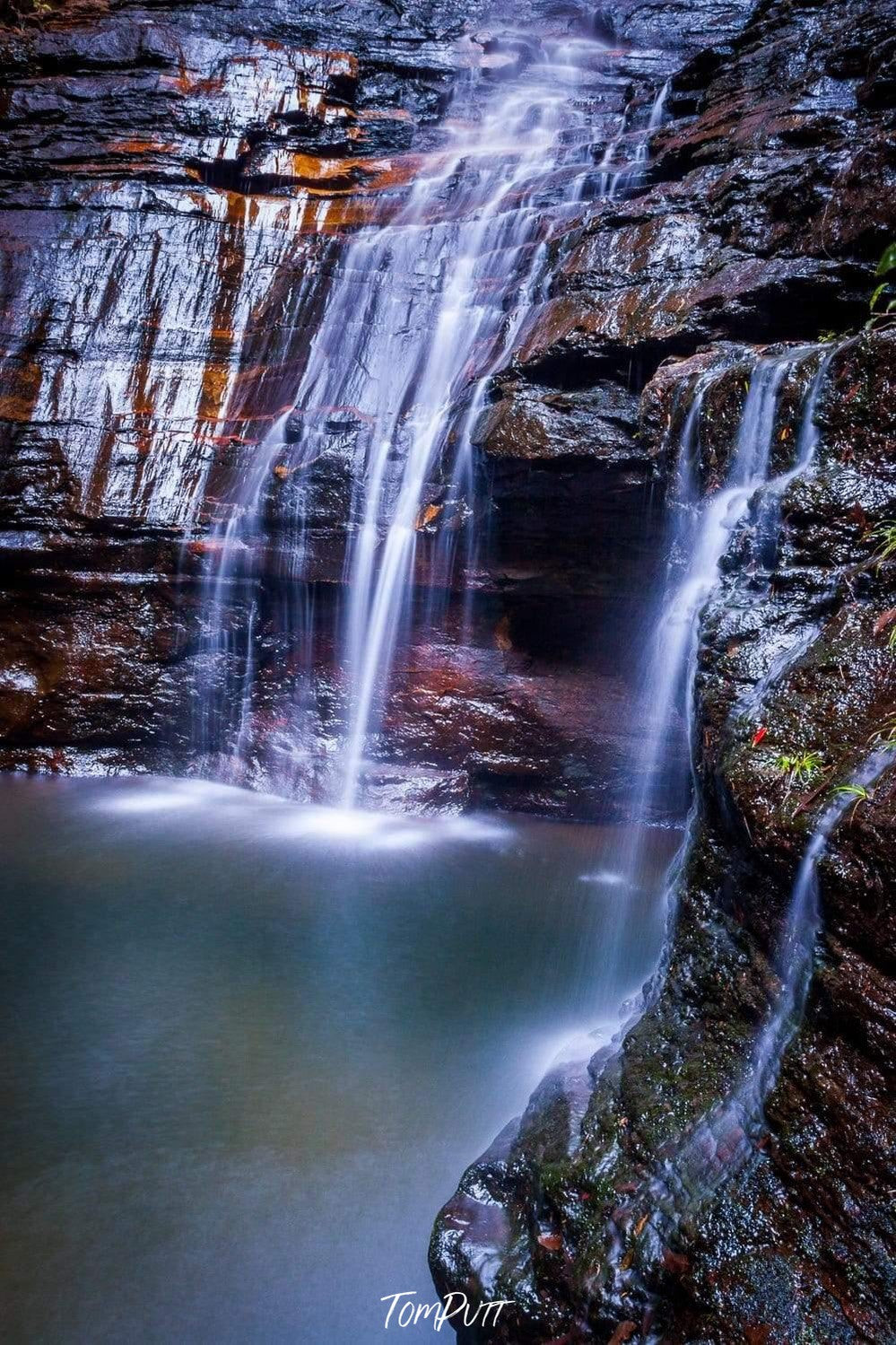 A dark view of the beautiful waterfall from rock of orange and dark brown shade, water, Empress Falls #3 - Blue Mountains NSW