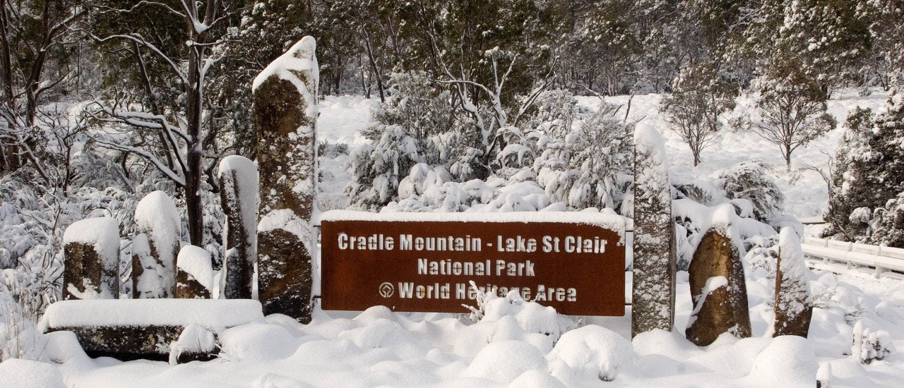 A snow-covered area with an address written on a wood plate, Cradle Mountain #2, Tasmania 