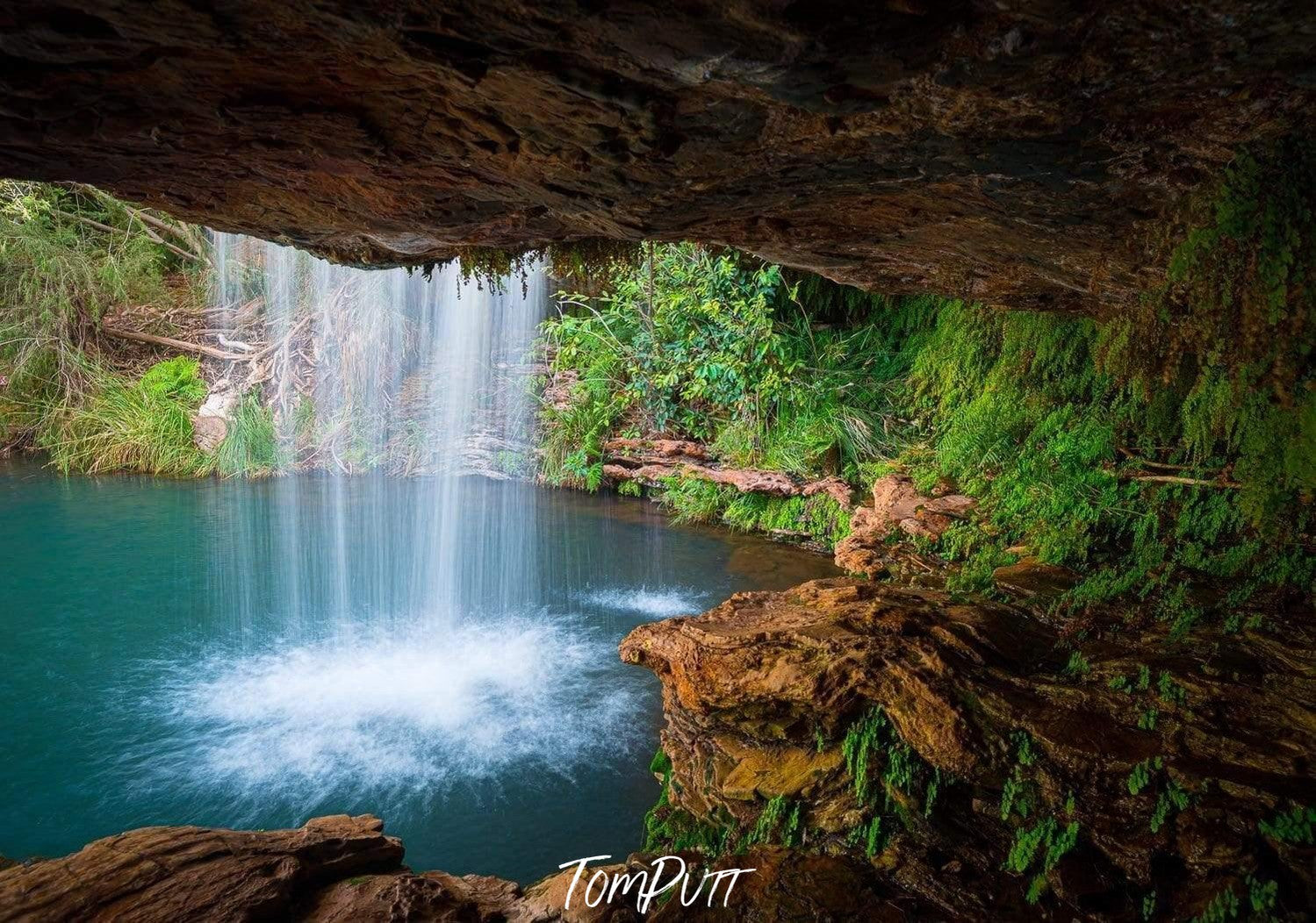 A small mountain wall with a waterfall, and a lot of greenery in surroundings, Fern Pool - Karijini, The Pilbara