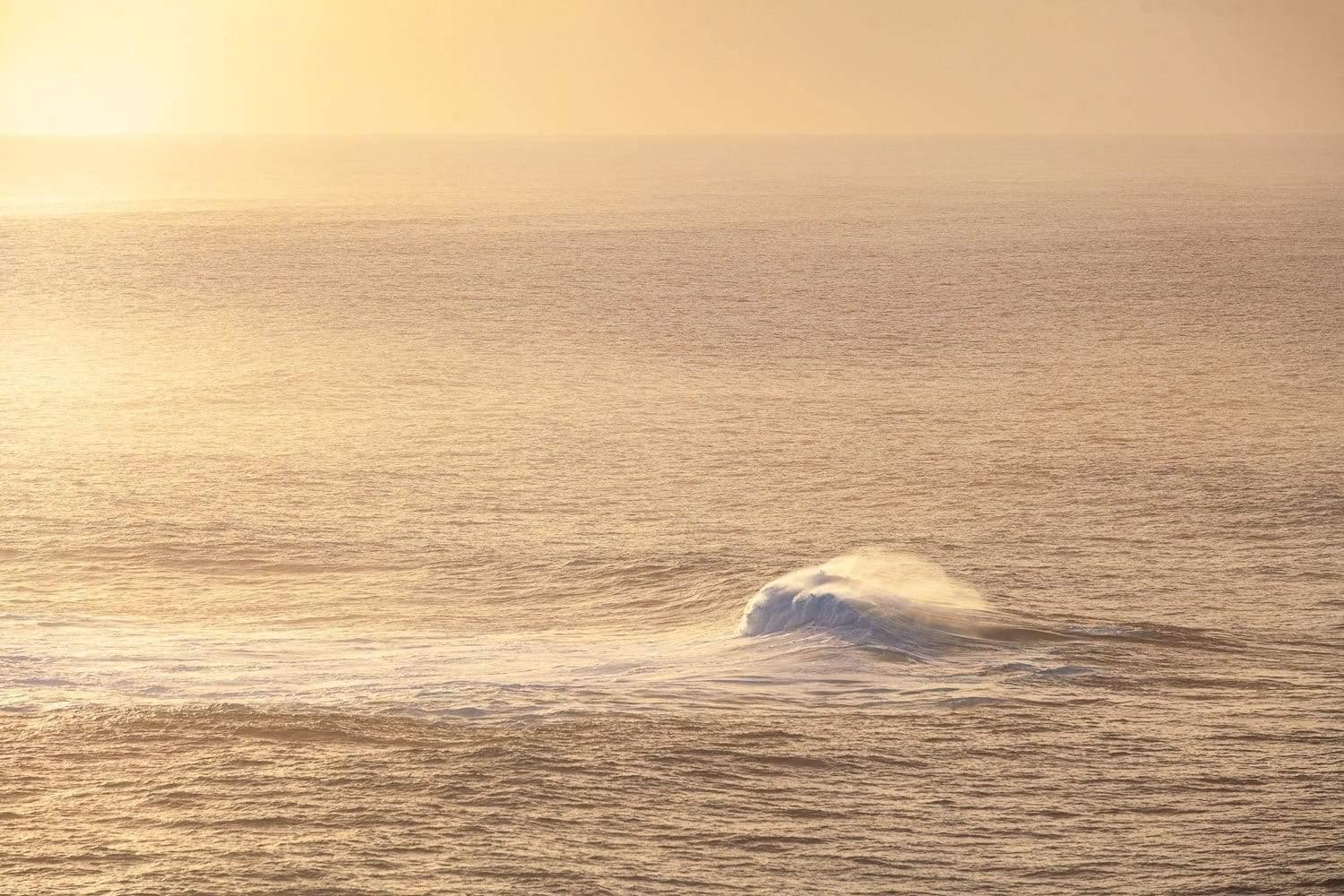 An ocean with waves, a light effect of sunlight, First Wave - Kangaroo Island SA