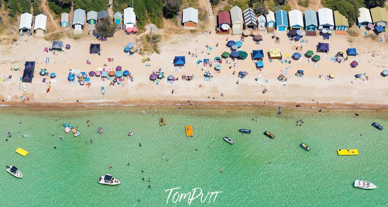 Aerial view of an ocean with many people on the beach and in water, Floating - Mornington Peninsula VIC