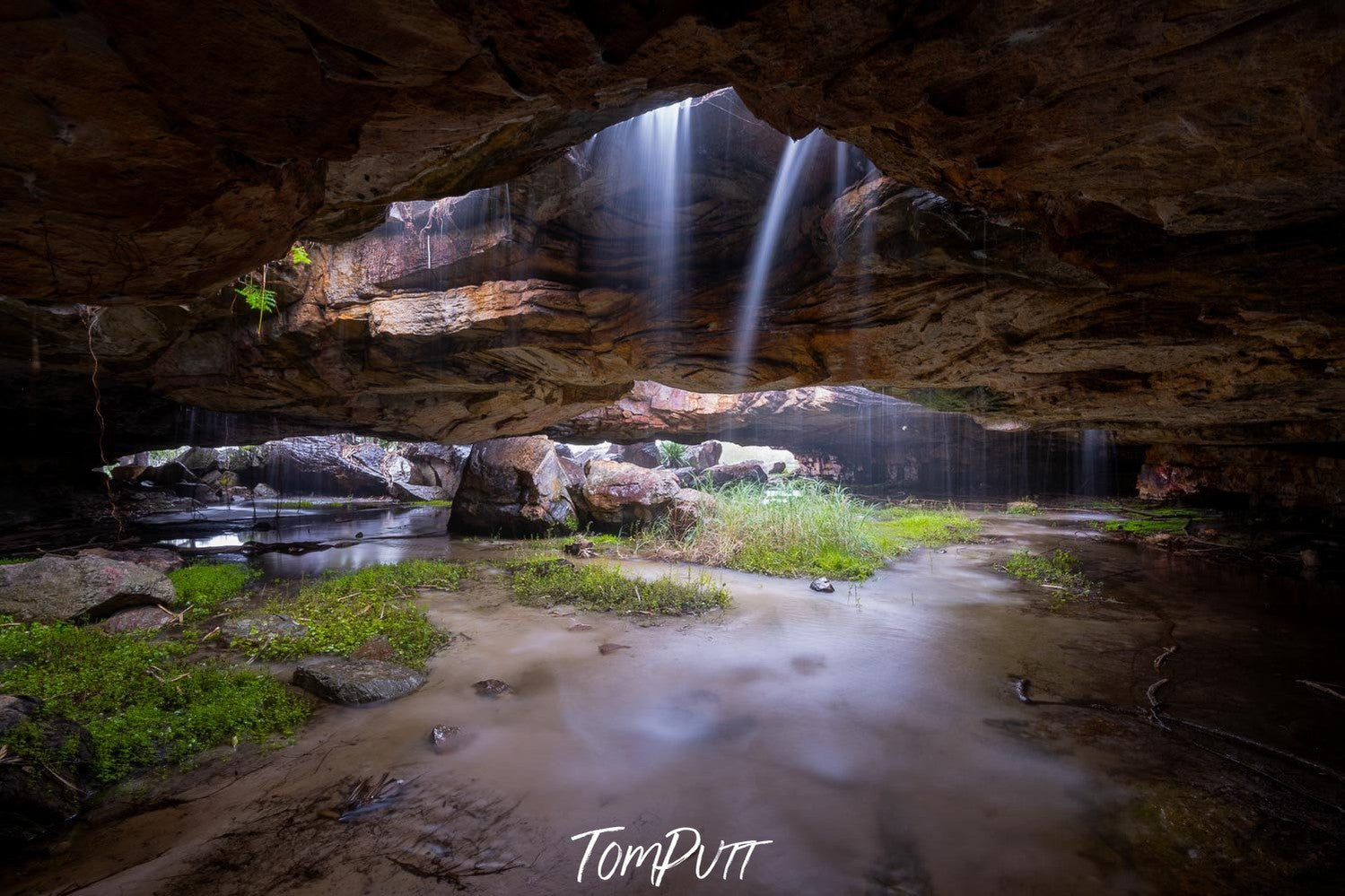 A daylight view of below the earth, a hollow area causing the passage of sunlight, Arnhem Land 5 – Northern Territory