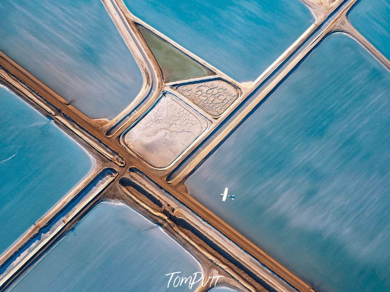 Aerial view of a map-like design having sky-blue background, Flying High